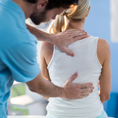 Chiropractic Northbrook IL Doctor Adjusting A Patient